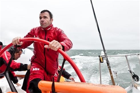 Mike Sanderson at the helm of Sanya Lan.