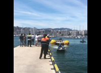 My Song is being towed to the pier in Palma.