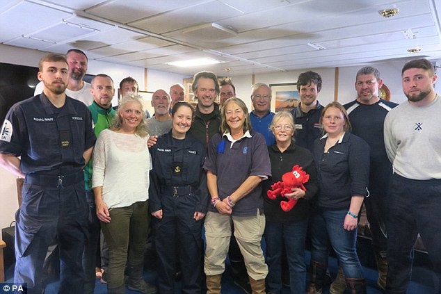 The crew of Clyde Challenger and his rescuers