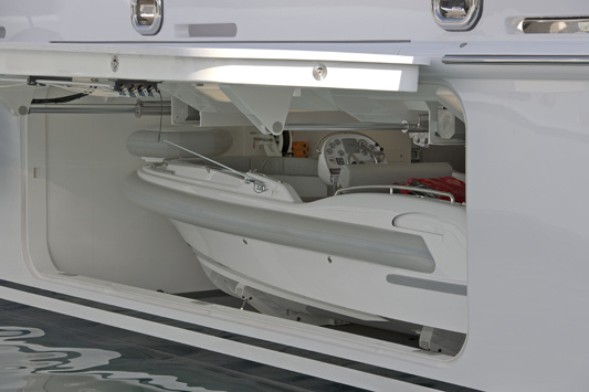 The tenders are hidden behind the hinged panels on the boards.