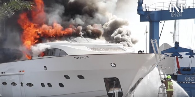 Burning boat in Alicante, Spain