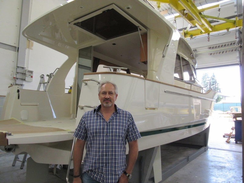 Vladimir Zinchenko on the background of Greenline yacht