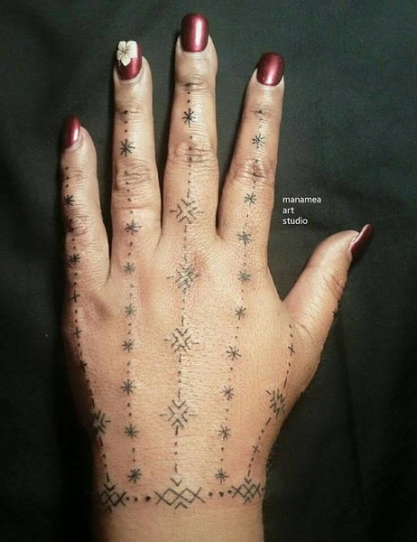 One of the traditional tattoos of Samoan women
