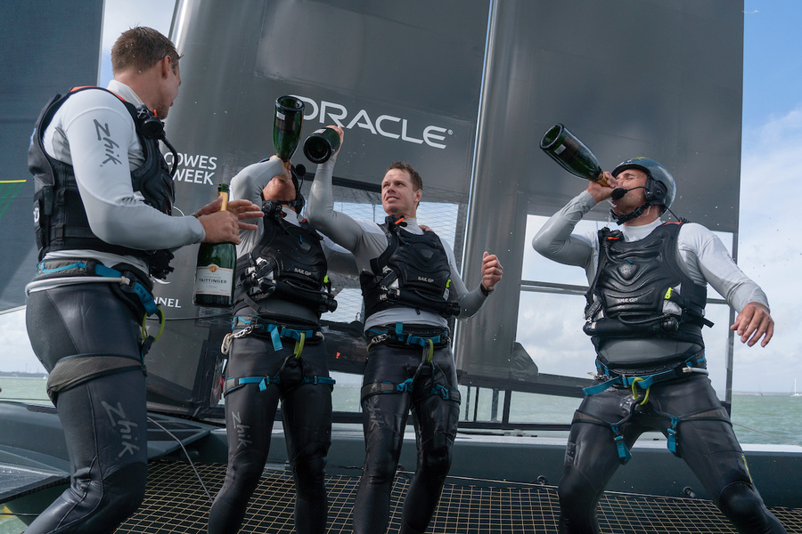 The Australian team celebrates the victory.