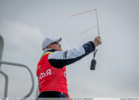 On the second day, the weather was completely ruined. If the wind was unpredictable the day before, it was gone now. Tuapse was in the zone of calm and only thanks to the persistence of judges in the afternoon it was possible to catch the rare strengthening of the wind to 2-3 knots and with grief fell to 4 races.