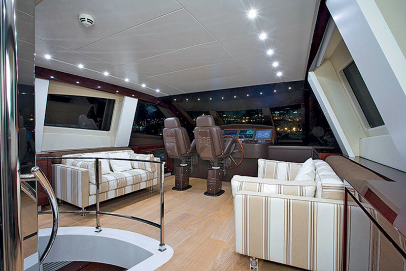 The unique Amer 116 wheelhouse is located in a closed part of the flybridge. It is accessible by elevator or via spiral staircase.