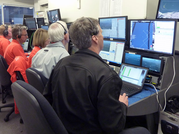 From right to left: Stan Honey, Ken Mills and other AC Liveline team members at work.