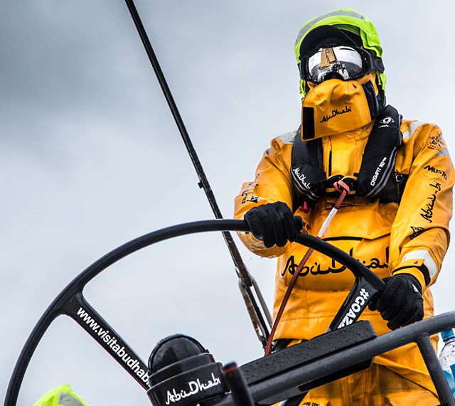 Crew member of the Abu Dhabi Ocean Sailing crew, dressed as Musto, during the Volvo Ocean Race. 