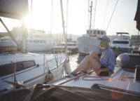 Some people think that you have to buy a lot of equipment to sail a boat, but you don't. Choose light-soled shoes and dress up as usual on vacation.