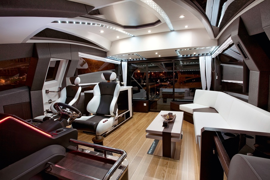 Glass sliding doors behind the bar rise or disappear into the floor, depending on the situation. Two chairs at the control desk will keep the captain bored.