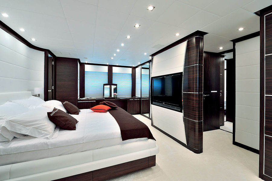 The master suite is the full width of the deck and the bathroom adjacent to the engine room also serves as an audio buffer.