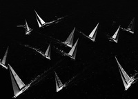«Black and white shot of yachts tacking upwind in Sydney Harbour at the start of the 2008 Rolex Sydney Hobart Yacht Race. I love shooting yachts from the air. The positioning and shape of the sails gives a different perspective»,