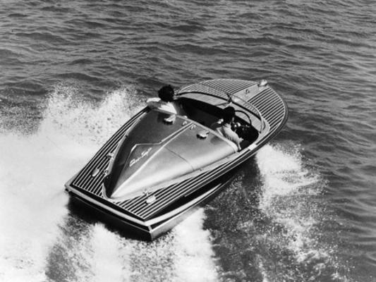 Elvis Presley on the Chris-Craft boat. 