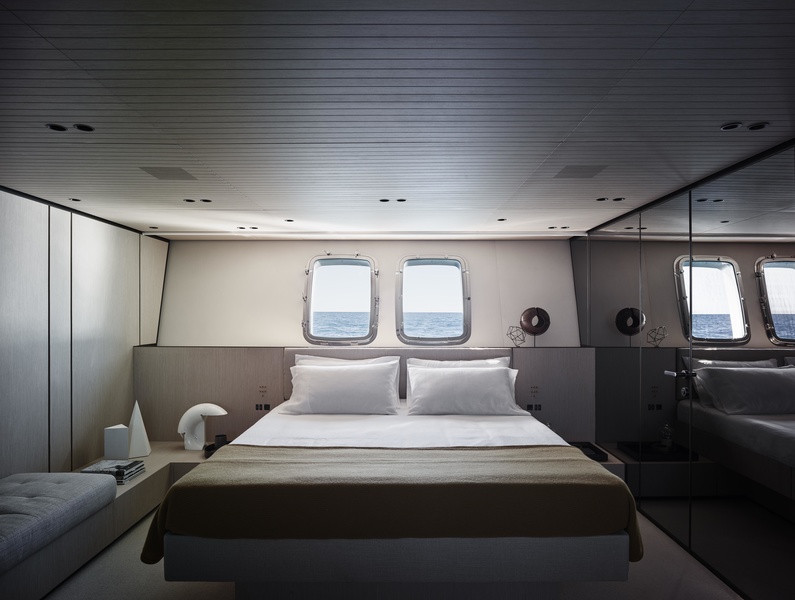 Master cabin on the lower deck of SX76. The mirror wall is actually a cupboard door.