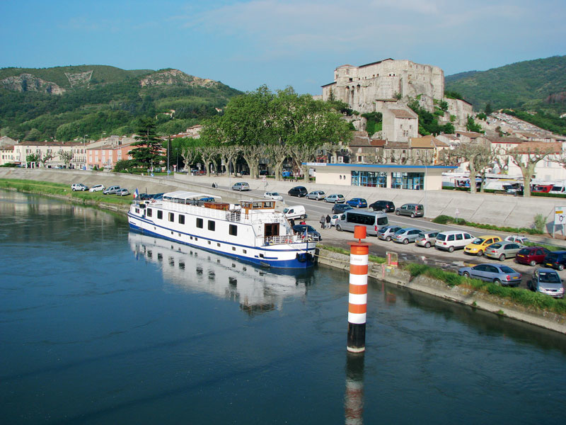 Napoleon on the quay of La Vulte sur Rhône, a remarkable plane tree alley and a typical Provencal bazaar.