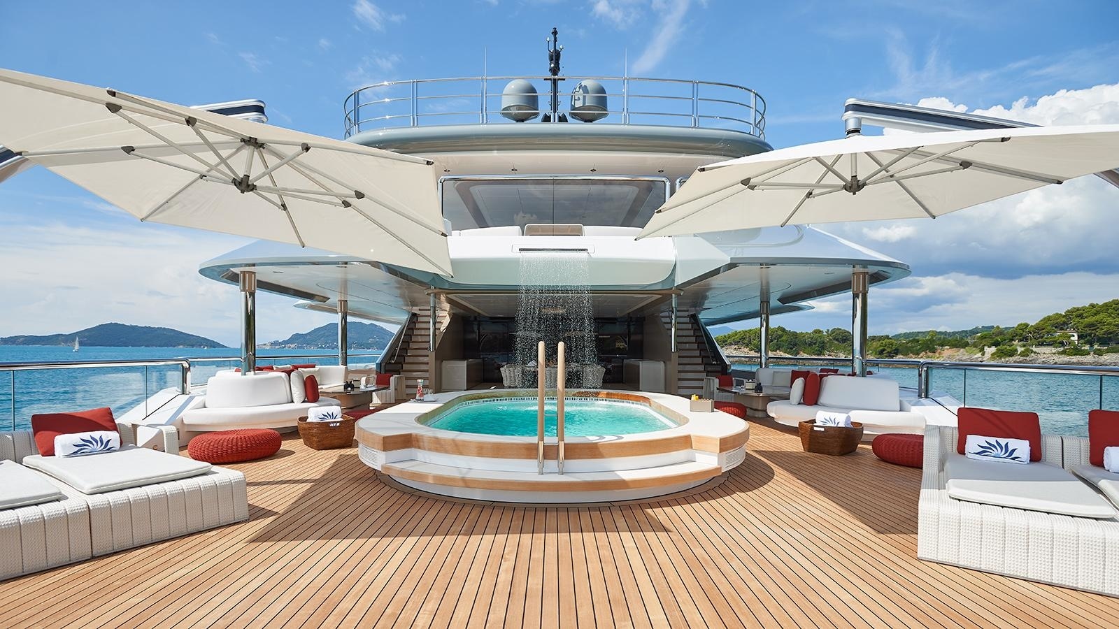 The oval pool with cascading waterfall is located on the main deck and is specially designed above the floor level to prevent small children accidentally falling into it.