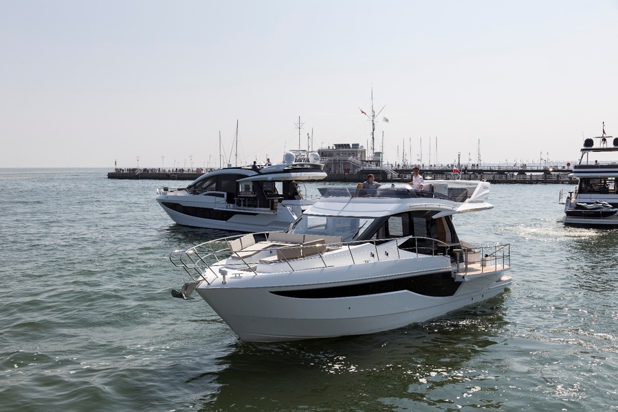 Galeon boats in front of the longest wooden pier in Europe