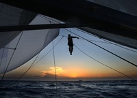 «Buck's Tim Harrold unfurls his spinnaker on the ASM Shockwave 5 off the coast of New South Wales on the first night of the 2008 Rolex Sydney Hobart Yacht Race. December 26, 2008»,